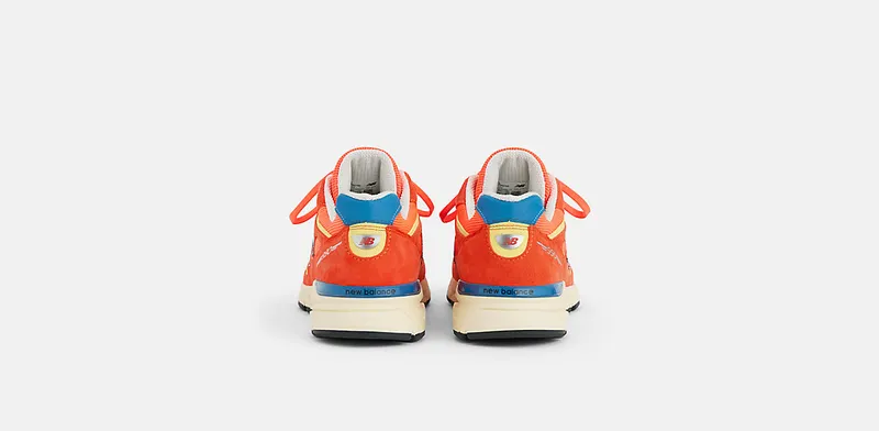 New Balance 990v4 – “Urgent Red / Maize / Afterglow” (U99076B)