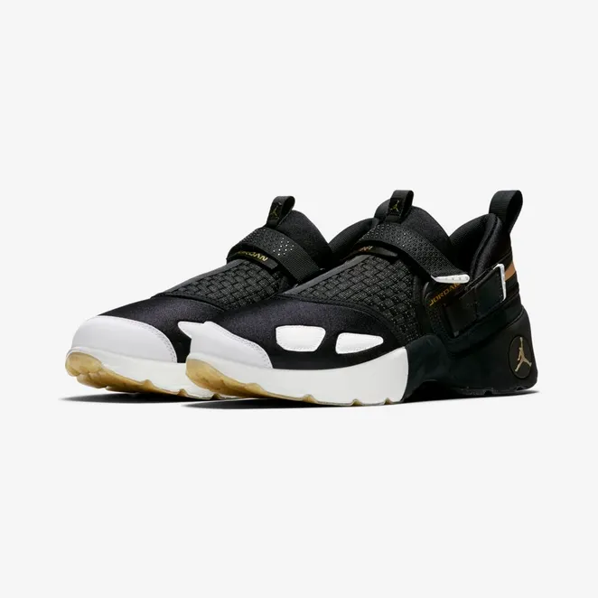 Jordan Trunner LX BHM “Black / White / Metallic Gold” (909408-032)