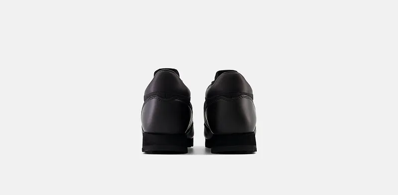 New Balance Rainier Low “Triple Black” (UALGSBBB)