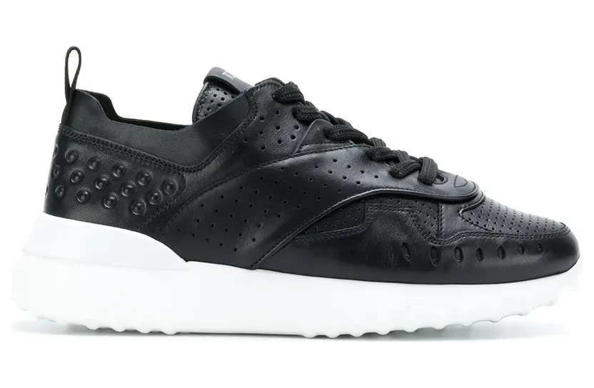 Tod’s geperforeerde vetersneakers “Black” (XXW80A0W590JUS)