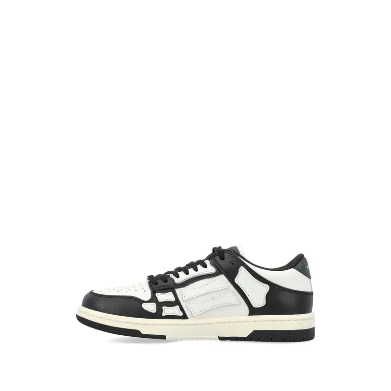Amiri Skel-top Low “Black/White” (AWFOSR1081 004)