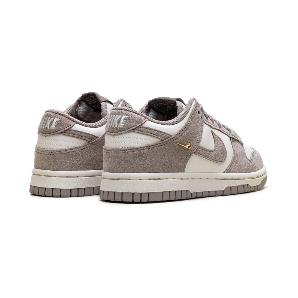 Nike Dunk Low “Malt Gold Mini Swoosh” (IB4417-105)