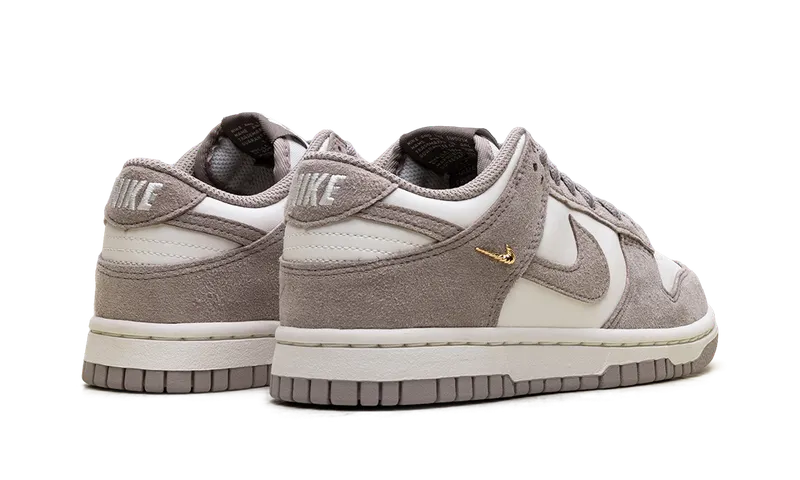 Nike Dunk Low “Malt Gold Mini Swoosh” (IB4417-105)