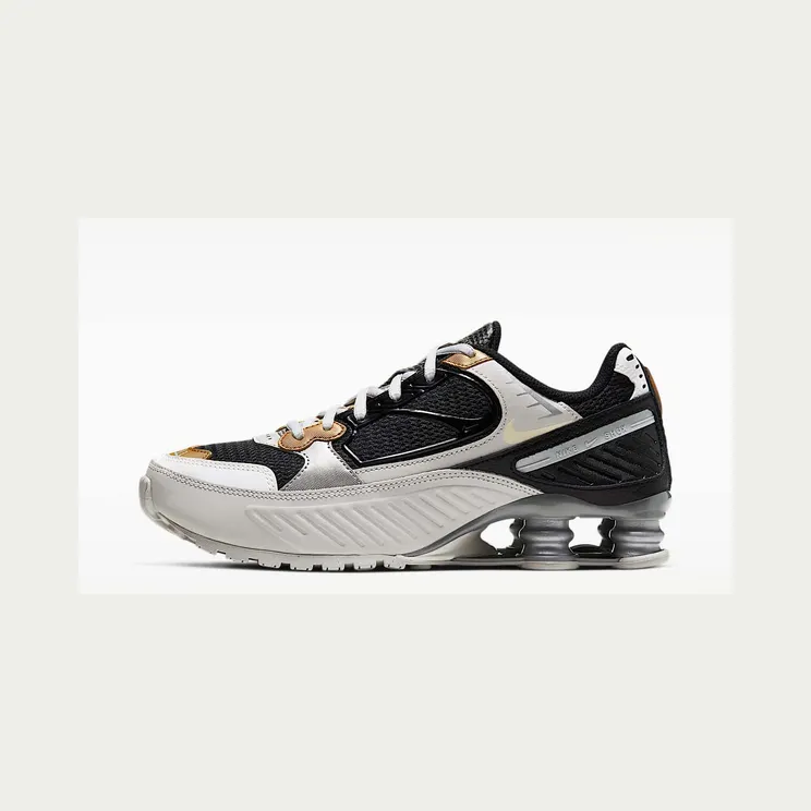 Nike Shox Enigma “Vast Grey / Black / Metallic Gold / Sail” (CT3452-001)