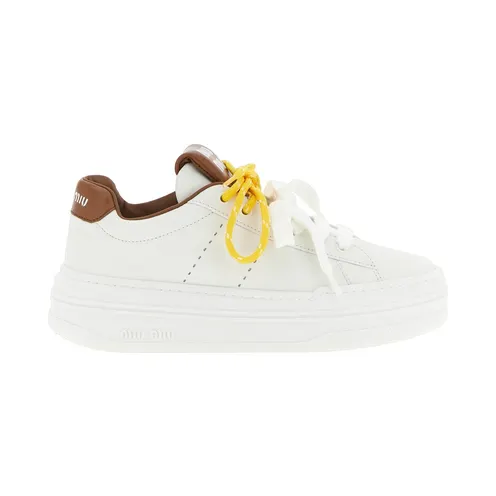 Miu Miu “Brown” (5E710EF0503L48F0TPR)