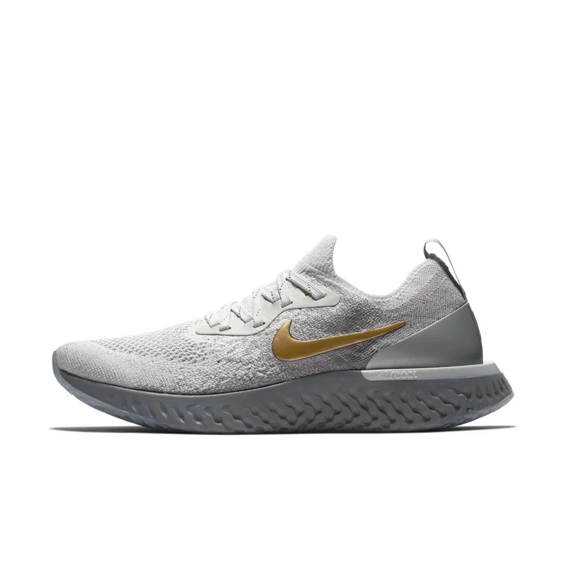 Nike Epic React Flyknit Vast Grey Metallic Gold (W) Vast Grey/Metallic Gold-Metallic Platinum-Gunsmoke-Atmosphere Grey (AV3048-070)