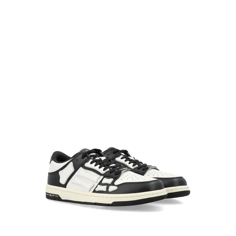 Amiri Skel-top Low “Black/White” (AWFOSR1081 004)