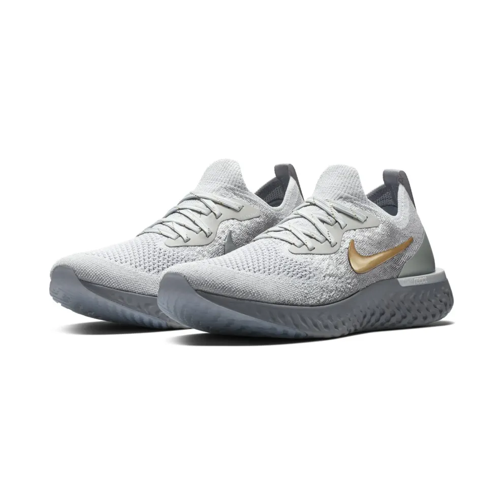 Nike Epic React Flyknit Vast Grey Metallic Gold (W) Vast Grey/Metallic Gold-Metallic Platinum-Gunsmoke-Atmosphere Grey (AV3048-070)