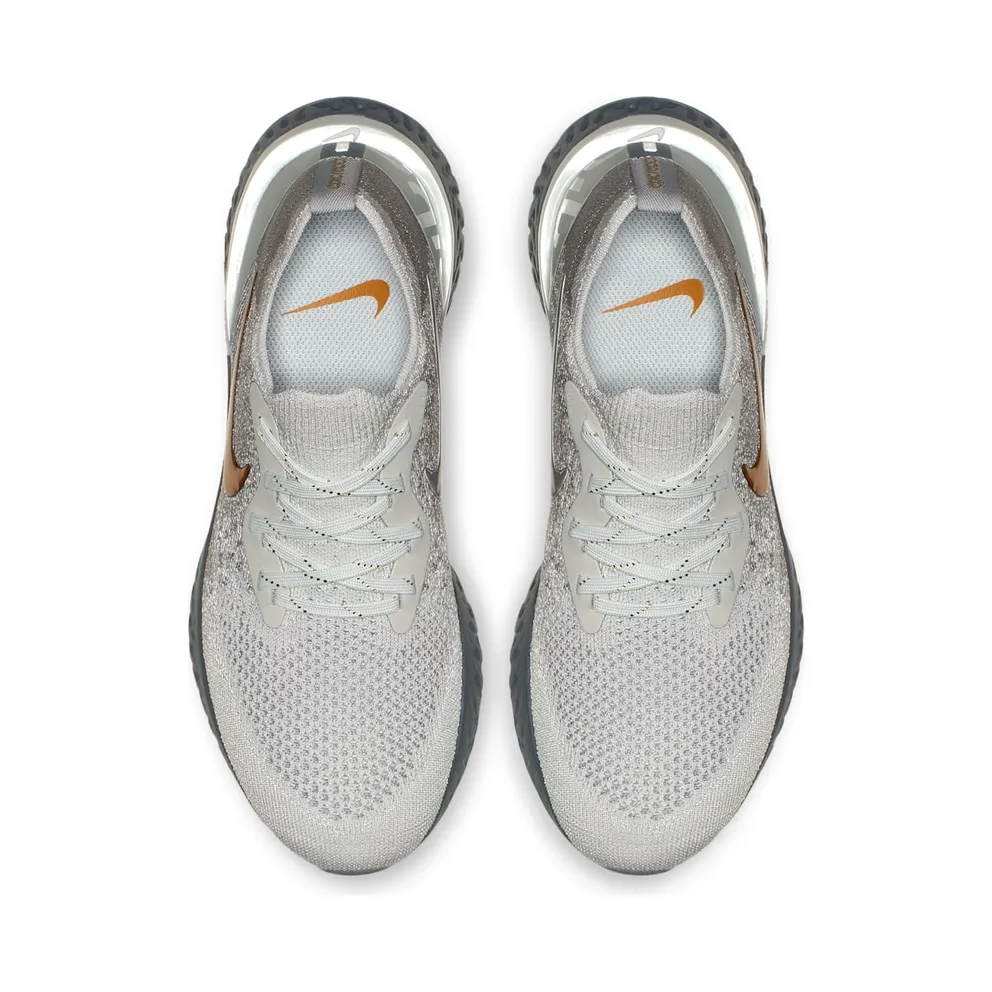 Nike Epic React Flyknit Vast Grey Metallic Gold (W) Vast Grey/Metallic Gold-Metallic Platinum-Gunsmoke-Atmosphere Grey (AV3048-070)